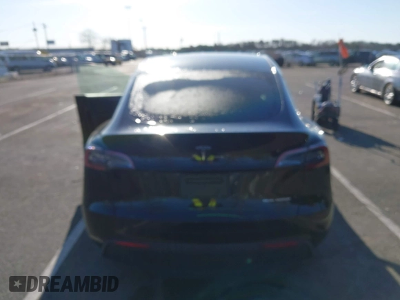 2023 Tesla Model Y Long Range with VIN 7SAYGAEE3PF925928, listed as a IAAI auction lot 41753910 with Not provided miles and . Bid and sale history available at DreamBid. Image 16.