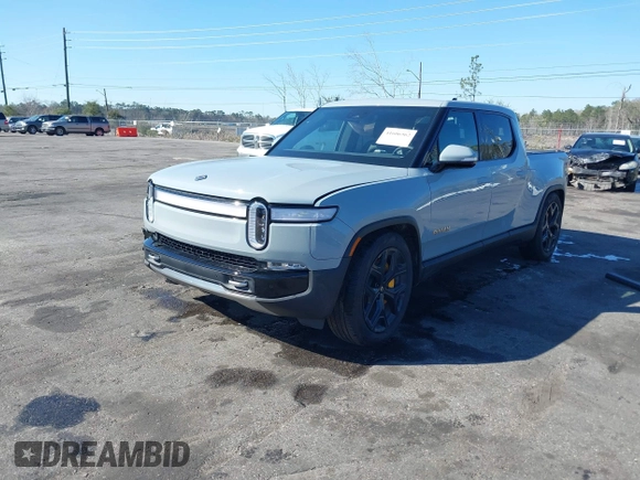 2024 Rivian R1T Adventure z VIN 7FCTGAAA5RN033799, wystawiony jako IAAI lot #41606562 z przebiegiem 9 449 mil mil oraz . Historia ofert i sprzedaży dostępna na DreamBid. Obrazek 17.