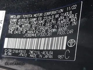 2023 Toyota Corolla Hybrid LE with VIN JTDBDMHE1P3001381, listed as a IAAI auction lot 41898054 with 76,971 mi miles. Bid and sale history available at carsss.com. Image 9.