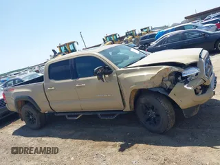 2017 Toyota Tacoma SR5 with VIN 3TMDZ5BN7HM032823, listed as a IAAI auction lot 41996067 with 109,344 mi miles and . Bid and sale history available at DreamBid. Image 14.