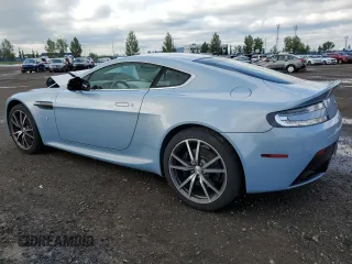 2015 Aston Martin Vantage z VIN SCFEKBAK2FGC19462, wystawiony jako Copart lot #61093934 z przebiegiem 53 068 mil mil oraz Szkoda całkowita • Salvage title. Historia ofert i sprzedaży dostępna na DreamBid. Obrazek 2.