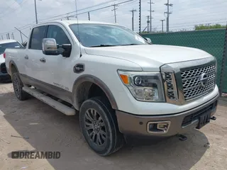 2017 Nissan Titan SV z VIN 1N6AA1F40HN515190, wystawiony jako IAAI lot #42044459 z przebiegiem 122 392 mil mil oraz . Historia ofert i sprzedaży dostępna na DreamBid. Obrazek 1.