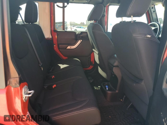 2014 Jeep Wrangler Unlimited Rubicon with VIN 1C4HJWFG5EL162736, listed as a Copart auction lot 64077645 with 126,330 mi miles and Salvage title. Bid and sale history available at DreamBid. Image 11.