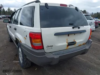 2004 Jeep Grand Cherokee Laredo with VIN 1J4GW48S54C393518, listed as a IAAI auction lot 41984570 with 187,066 mi miles. Bid and sale history available at carsss.com. Image 6.