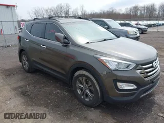 2014 Hyundai Santa Fe Sport with VIN 5XYZU3LB4EG179638, listed as a IAAI auction lot 42022657 with 74,038 mi miles. Bid and sale history available at carsss.com. Image 1.