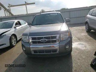 2012 Ford Escape Limited z VIN 1FMCU0EG1CKB30638, wystawiony jako Copart lot #52905205 z przebiegiem 169 683 mil mil oraz Szkoda całkowita • Salvage title. Historia ofert i sprzedaży dostępna na DreamBid. Obrazek 11.