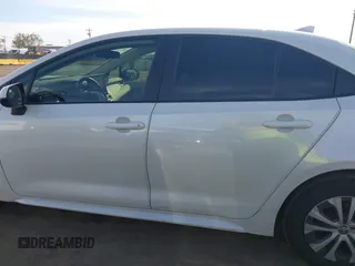 2020 Toyota Corolla Hybrid LE with VIN JTDEBRBE4LJ019579, listed as a IAAI auction lot 42024106 with 59,240 mi miles. Bid and sale history available at carsss.com. Image 15.