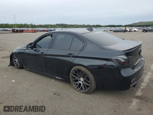 2014 BMW 3 Series 335i xDrive with VIN WBA3B9C55EF588272, listed as a Copart auction lot 58565145 with 88,085 mi miles and Salvage title. Bid and sale history available at DreamBid. Image 2.