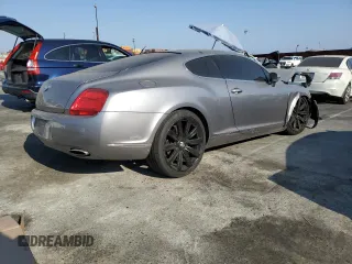 2007 Bentley Continental GT с VIN SCBCR73W77C049977, выставлен на аукционе Copart как лот 62533184 с пробегом Не указан миль и Списание • Salvage title. История ставок и продаж доступна на DreamBid. Изображение 3.