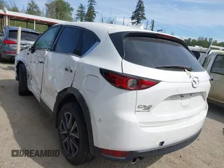 2018 Mazda CX-5 Grand Touring with VIN JM3KFBDM1J0309260, listed as a IAAI auction lot 42247237 with Not Provided miles and . Bid and sale history available at DreamBid. Image 3.
