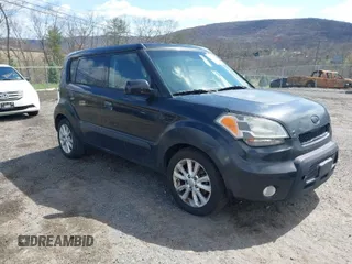 2010 Kia Soul + with VIN KNDJT2A29A7038620, listed as a IAAI auction lot 41989573 with 141,312 mi miles. Bid and sale history available at carsss.com. Image 1.