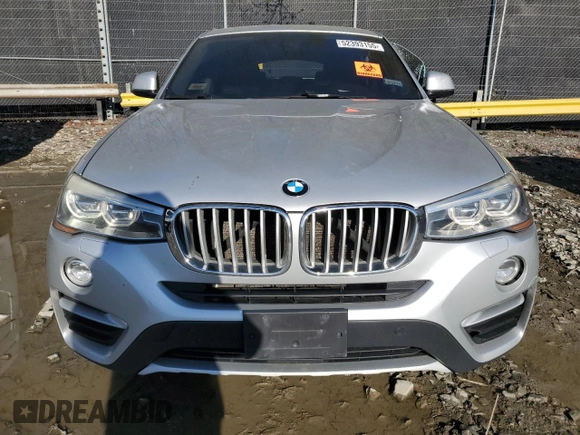 2017 BMW X4 xDrive28i with VIN 5UXXW3C52H0T77719, listed as a Copart auction lot 52393155 with 184,664 mi miles and Salvage title. Bid and sale history available at DreamBid. Image 5.