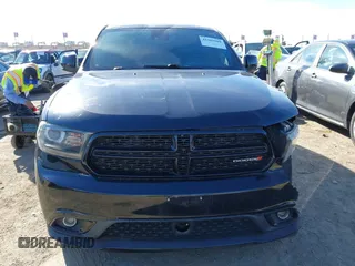 2015 Dodge Durango R/T with VIN 1C4SDHCT5FC937676, listed as a IAAI auction lot 41369508 with 107,075 mi miles and . Bid and sale history available at DreamBid. Image 12.