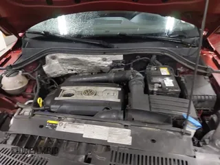 2014 Volkswagen Tiguan S z VIN WVGBV3AXXEW045826, wystawiony jako IAAI lot #42173285 z przebiegiem 126 260 mil mil oraz . Historia ofert i sprzedaży dostępna na DreamBid. Obrazek 10.
