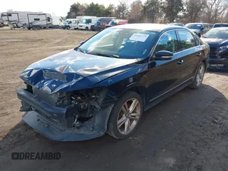 2014 Volkswagen Passat TDI SEL Premium with VIN 1VWCN7A33EC092174, listed as a IAAI auction lot 41690739 with 141,095 mi miles. Bid and sale history available at carsss.com. Image 2.
