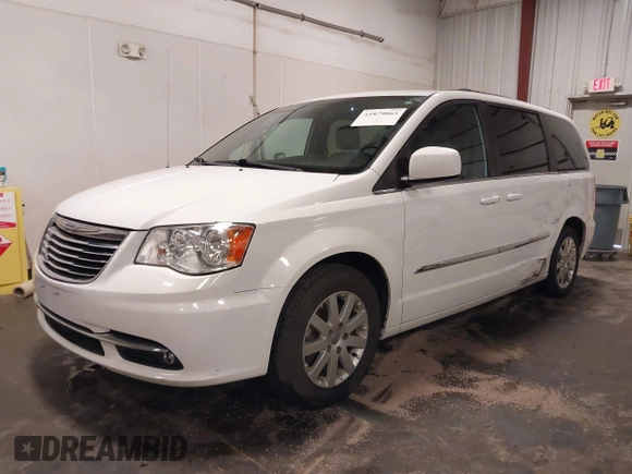 2015 Chrysler Town & Country Touring with VIN 2C4RC1BG9FR626482, listed as a IAAI auction lot 41879865 with 129,694 mi miles and . Bid and sale history available at DreamBid. Image 20.