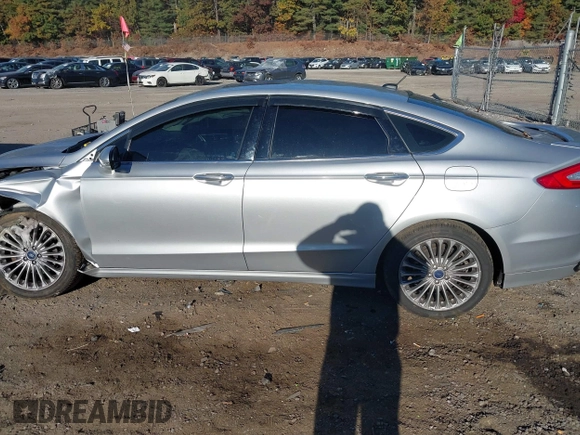 2016 Ford Fusion Titanium with VIN 3FA6P0K9XGR100723, listed as a IAAI auction lot 40627172 with 1 mi miles. Bid and sale history available at carsss.com. Image 13.