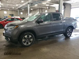 2019 Honda Ridgeline RTL with VIN 5FPYK3F5XKB029468, listed as a Copart auction lot 61824695 with 74,785 mi miles and Salvage title. Bid and sale history available at DreamBid. Image 1.