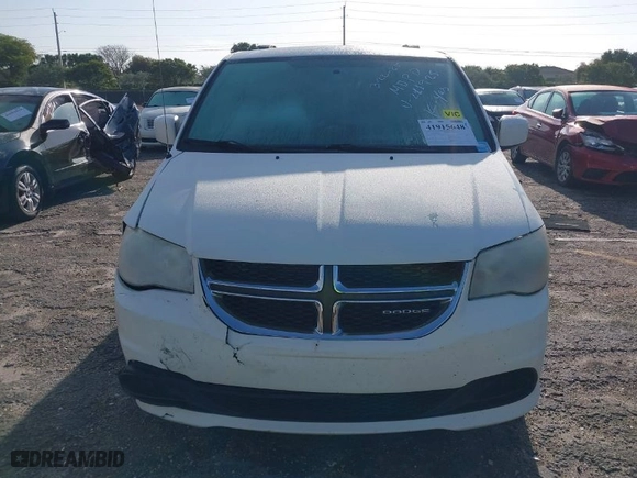 2012 Dodge Grand Caravan SXT with VIN 2C4RDGCGXCR211925, listed as a IAAI auction lot 41915648 with 150,885 mi miles. Bid and sale history available at carsss.com. Image 12.