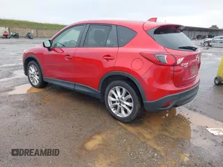2015 Mazda CX-5 Grand Touring with VIN JM3KE4DY6F0501072, listed as a IAAI auction lot 41534176 with 90,160 mi miles. Bid and sale history available at carsss.com. Image 3.