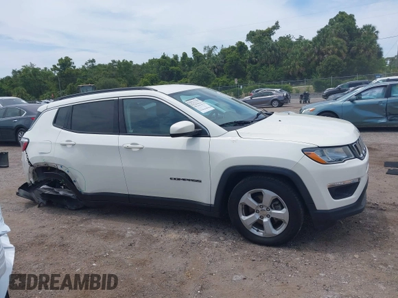 2018 Jeep Compass Latitude with VIN 3C4NJCBB8JT293444, listed as a IAAI auction lot 42372611 with 38,928 mi miles and . Bid and sale history available at DreamBid. Image 14.