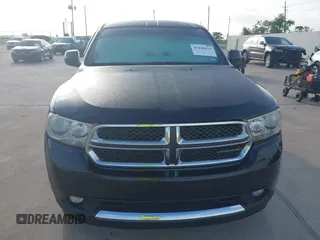 2012 Dodge Durango SXT with VIN 1C4RDJAG7CC293167, listed as a IAAI auction lot 42446634 with 140,182 mi miles and . Bid and sale history available at DreamBid. Image 12.