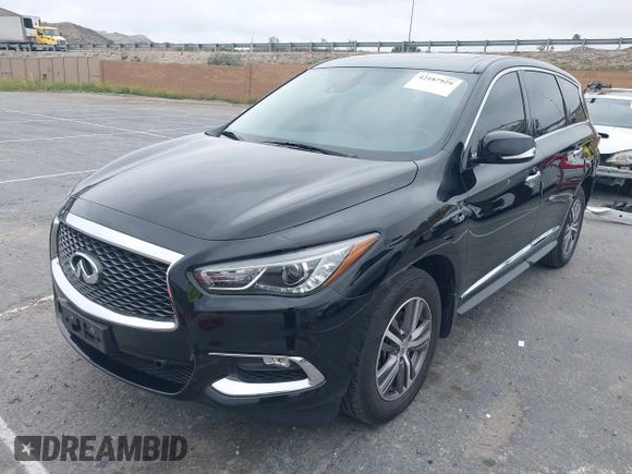 2020 Infiniti QX60 Luxe with VIN 5N1DL0MN2LC540608, listed as a IAAI auction lot 42187929 with 82,227 mi miles and . Bid and sale history available at DreamBid. Image 2.