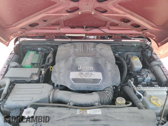 2012 Jeep Wrangler Unlimited Sport z VIN 1C4BJWDG7CL214633, wystawiony jako Copart lot #54547655 z przebiegiem 80 720 mil mil oraz Szkoda całkowita • Salvage title. Historia ofert i sprzedaży dostępna na DreamBid. Obrazek 12.