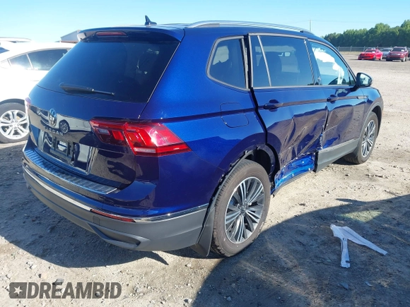 2024 Volkswagen Tiguan Wolfsburg Edition with VIN 3VV6B7AX5RM225695, listed as a IAAI auction lot 42329930 with 7,628 mi miles and . Bid and sale history available at DreamBid. Image 4.