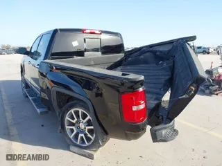 2015 GMC Sierra 1500 Denali with VIN 3GTU2WEC7FG204610, listed as a IAAI auction lot 41730939 with 130,620 mi miles. Bid and sale history available at carsss.com. Image 3.