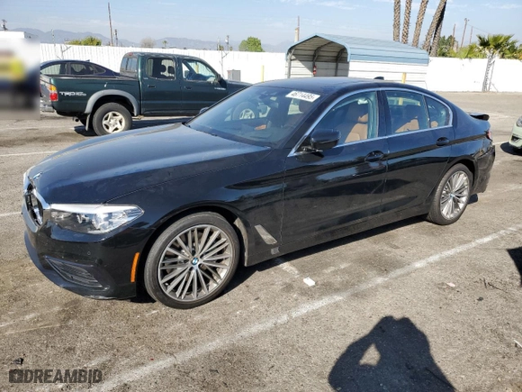 2019 BMW 5 Series 530i with VIN WBAJA5C54KBX87318, listed as a Copart auction lot 46714495 with 101,242 mi miles and Salvage Title. Bid and sale history available at carsss.com. Image 1.