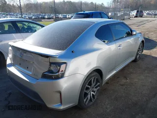2014 Scion tC with VIN JTKJF5C74E3088669, listed as a IAAI auction lot 41891175 with 86,160 mi miles. Bid and sale history available at carsss.com. Image 4.