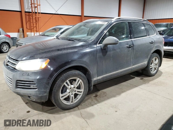 2013 Volkswagen Touareg Sport с VIN WVGEP9BP5DD008301, выставлен на аукционе Copart как лот 85085984 с пробегом 204 735 миль миль и Списание • Salvage title. История ставок и продаж доступна на DreamBid. Изображение 1.