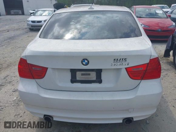 2011 BMW 3 Series 335i with VIN WBAPM5C51BE575704, listed as a IAAI auction lot 42005354 with 205,263 mi miles. Bid and sale history available at carsss.com. Image 15.