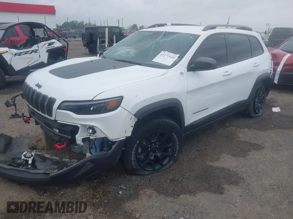 2021 Jeep Cherokee Trailhawk with VIN 1C4PJMBX4MD239112, listed as a IAAI auction lot 42271040 with 62,917 mi miles and . Bid and sale history available at DreamBid. Image 20.