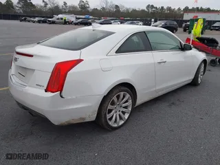 2015 Cadillac ATS Coupe Standard AWD with VIN 1G6AG1RX0F0127073, listed as a IAAI auction lot 41296448 with 119,718 mi miles. Bid and sale history available at carsss.com. Image 4.