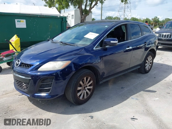 2010 Mazda CX-7 Sport with VIN JM3ER2W5XA0301457, listed as a IAAI auction lot 42257772 with 229,697 mi miles and . Bid and sale history available at DreamBid. Image 2.
