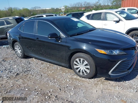 2022 Toyota Camry Hybrid LE with VIN 4T1C31AK7NU580160, listed as a IAAI auction lot 41982741 with 65,243 mi miles. Bid and sale history available at carsss.com. Image 1.