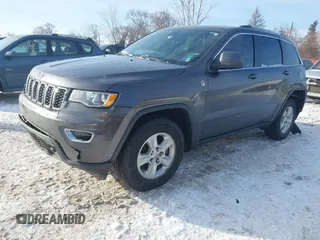2017 Jeep Grand Cherokee Laredo with VIN 1C4RJFAG7HC876531, listed as a IAAI auction lot 41354471 with 129,056 mi miles. Bid and sale history available at carsss.com. Image 16.