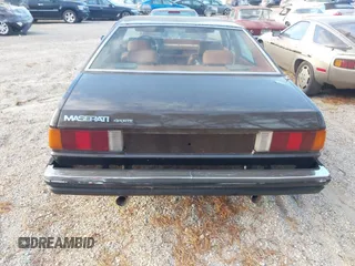 1982 Maserati Quattroporte z VIN ZAMBC1102CA301920, wystawiony jako IAAI lot #41297603 z przebiegiem 62 287 mil mil oraz . Historia ofert i sprzedaży dostępna na DreamBid. Obrazek 16.