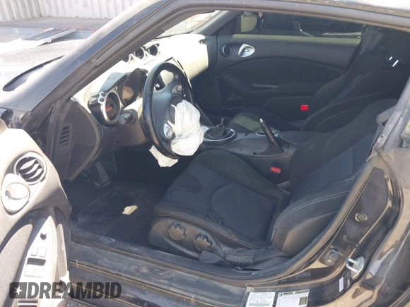 2013 Nissan 370Z z VIN JN1AZ4EH8DM880849, wystawiony jako IAAI lot #42131189 z przebiegiem Nie podano mil oraz . Historia ofert i sprzedaży dostępna na DreamBid. Obrazek 8.