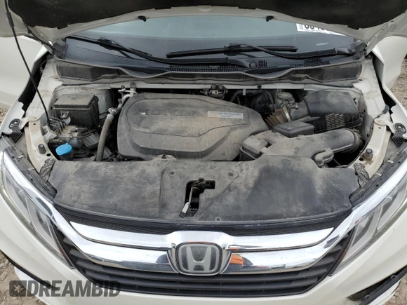 2018 Honda Odyssey EX-L with VIN 5FNRL6H71JB059936, listed as a Copart auction lot 53403635 with 94,745 mi miles and Salvage Title. Bid and sale history available at DreamBid. Image 14.