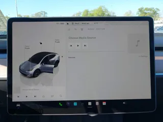 2025 Tesla Model Y Long Range with VIN 7SAYGDED7SA376233, listed as a IAAI auction lot 41777876 with 70 mi miles and . Bid and sale history available at DreamBid. Image 18.