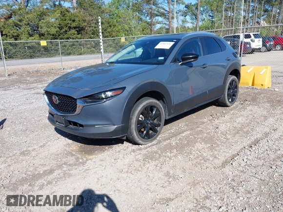 2023 Mazda CX-30 2.5 S Carbon Edition with VIN 3MVDMBCM5PM528946, listed as a IAAI auction lot 41882936 with 62,815 mi miles. Bid and sale history available at carsss.com. Image 17.