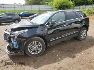 2023 Cadillac XT5 AWD Premium Luxury with VIN 1GYKNDRS0PZ172387, listed as a Copart auction lot 61455755 with 6,753 mi miles and Salvage title. Bid and sale history available at DreamBid. Image 1.