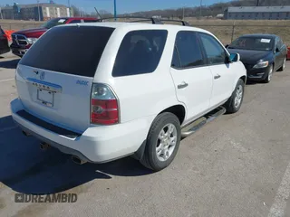2004 Acura MDX Touring Pkg w/Navigation with VIN 2HNYD18844H524383, listed as a IAAI auction lot 41593278 with 253,003 mi miles. Bid and sale history available at carsss.com. Image 4.