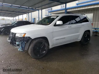 2015 Jeep Grand Cherokee Summit with VIN 1C4RJFJT1FC844975, listed as a Copart auction lot 45424455 with 75,471 mi miles and Salvage Title. Bid and sale history available at carsss.com. Image 1.