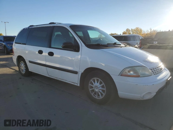2003 Ford Windstar LX with VIN 2FMZA51493BB24849, listed as a Copart auction lot 76728704 with 156,820 mi miles and Salvage Title. Bid and sale history available at DreamBid. Image 4.