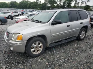 2004 GMC Envoy SLE z VIN 1GKDT13S542449085, wystawiony jako Copart lot #58900295 z przebiegiem 119 239 mil mil oraz Czysty tytuł • Clean title. Historia ofert i sprzedaży dostępna na DreamBid. Obrazek 1.