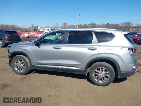 2020 Hyundai Santa Fe SE z VIN 5NMS2CAD7LH269302, wystawiony jako IAAI lot #41833303 z przebiegiem 70 665 mil mil oraz . Historia ofert i sprzedaży dostępna na DreamBid. Obrazek 14.